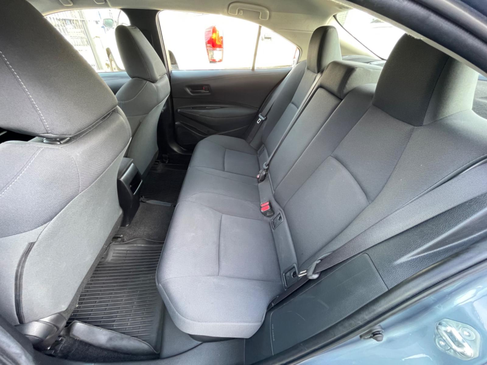 2022 Blue /Silver Toyota Corolla LE (JTDEAMDEXNJ) with an 1.8L Hybrid engine, Automatic transmission, located at 1501 West 15th St., Houston, 77008, (713) 869-2925, 29.797941, -95.411789 - Photo #5